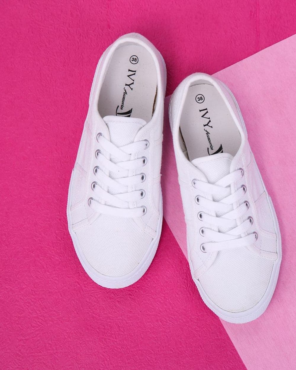 A pair of white sneakers